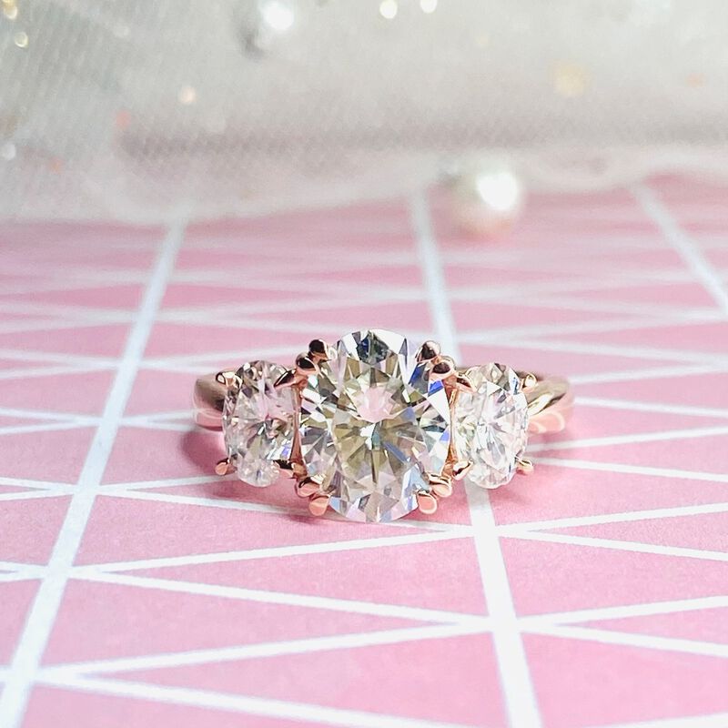 Oval Moissanite 3-Stone Ring in 10k Rose Gold image number null