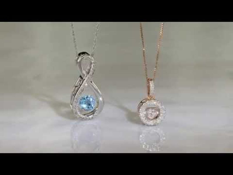 Beats of Love: Blue Topaz & Diamond Infinity Pendant in Sterling Silver image number null