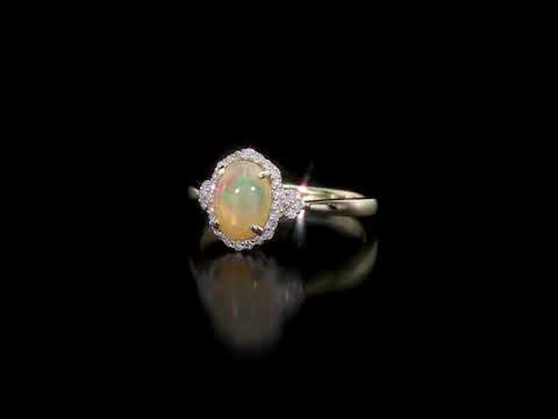 Ethiopian Oval Opal & Diamond Halo Ring in 10k Yellow Gold image number null