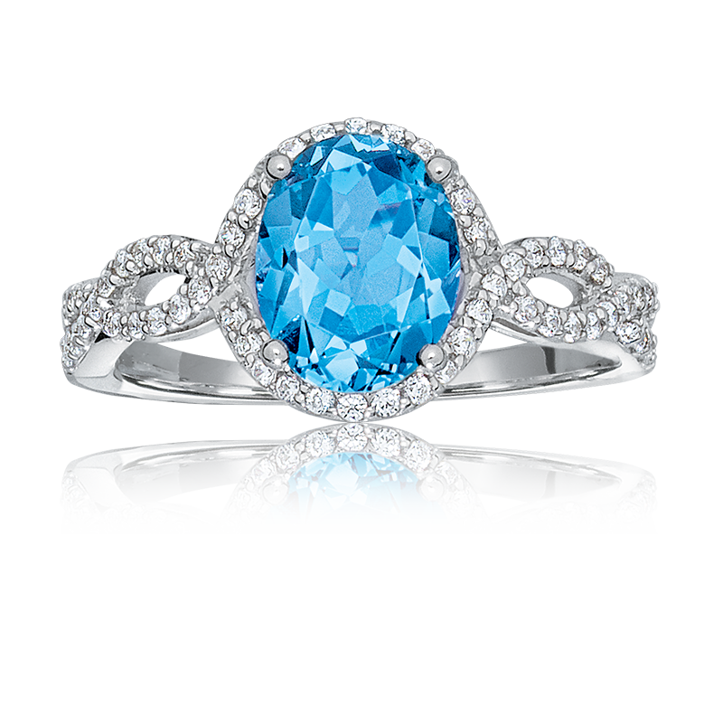 Oval Blue Topaz & Diamond Halo Ring in 10k White Gold image number null
