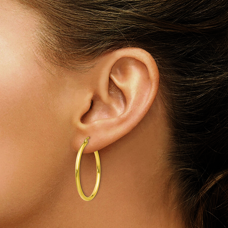 2x30mm Lightweight Tube Hoop Earrings in 14k Yellow Gold image number null