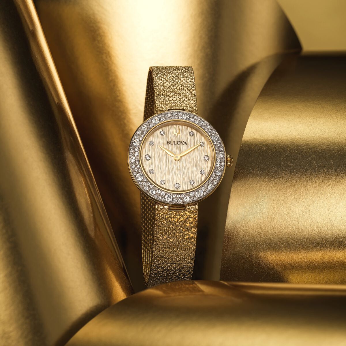 Bulova Ladies' Gold Tone Champagne Dial WIth Crystal Markers Bezel