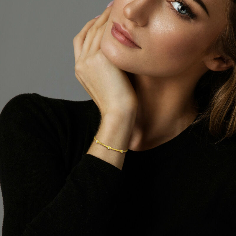 Cubic Zirconia Twist Open Bangle in Gold Plated image number null