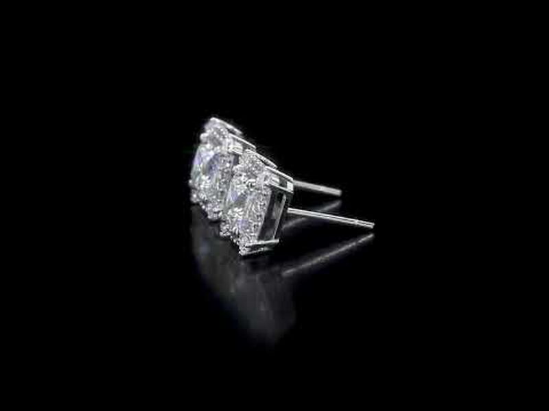 Moissanite and Diamond Halo Stud Earrings in 10k White Gold  image number null