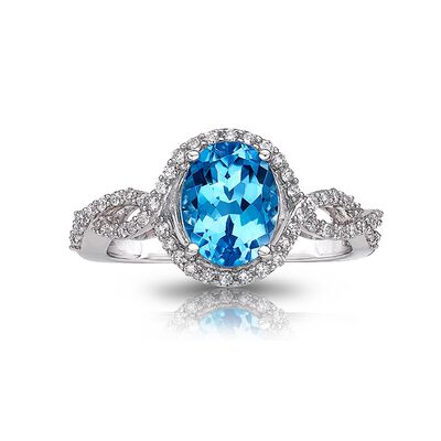 Oval Blue Topaz & Diamond Halo Ring in 10k White Gold