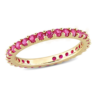 Created Ruby Eternity Band in 10k Yellow Gold
