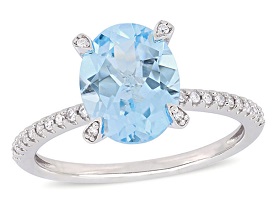 Oval Sky Blue Topaz & Diamond Engagement Ring in 10k White Gold